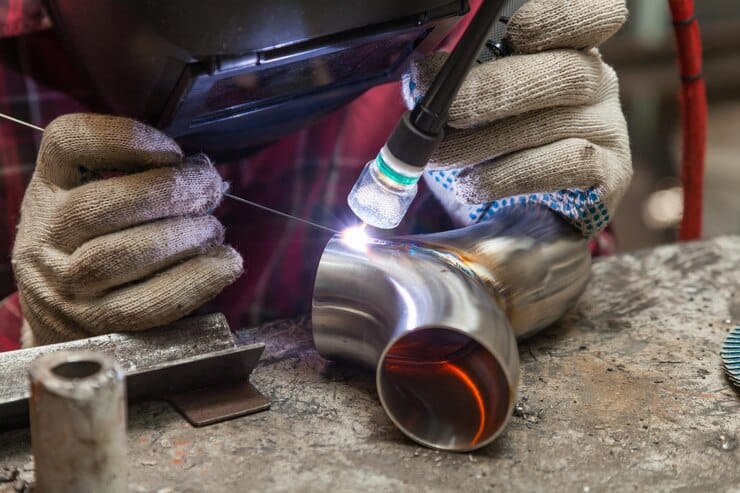 TIG weld a pipe with PPE