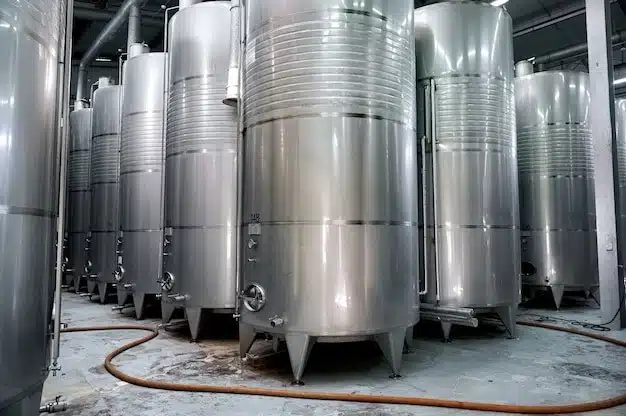 Metallic tank barrels in a factory