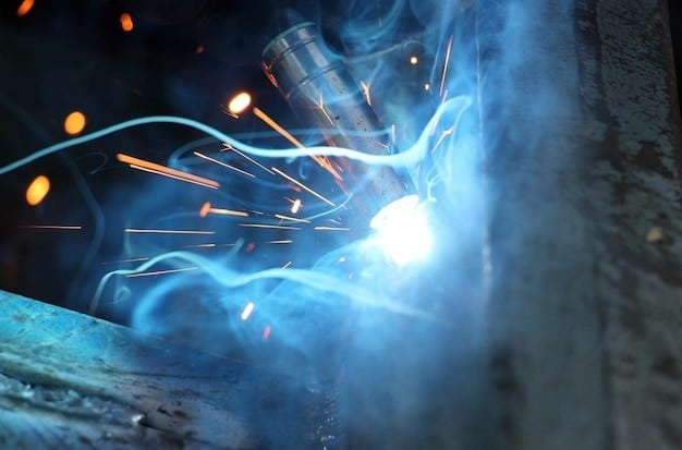 A MIG welder torch close up