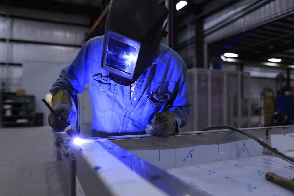 Professional TIG welding requires precise shielding gas control to prevent contamination and ensure weld quality.