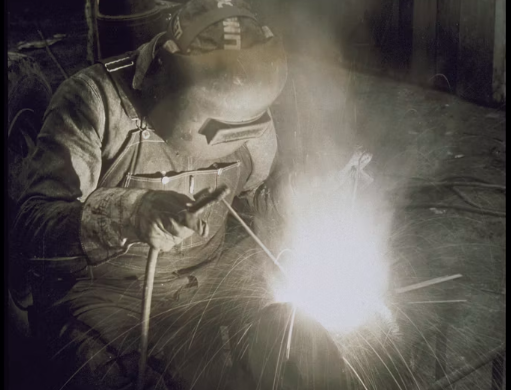 Workers are using stick welders to weld aluminum products.